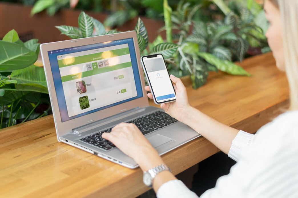 A female developer testing out mobile optimization for WooCommerce Shop on her phone