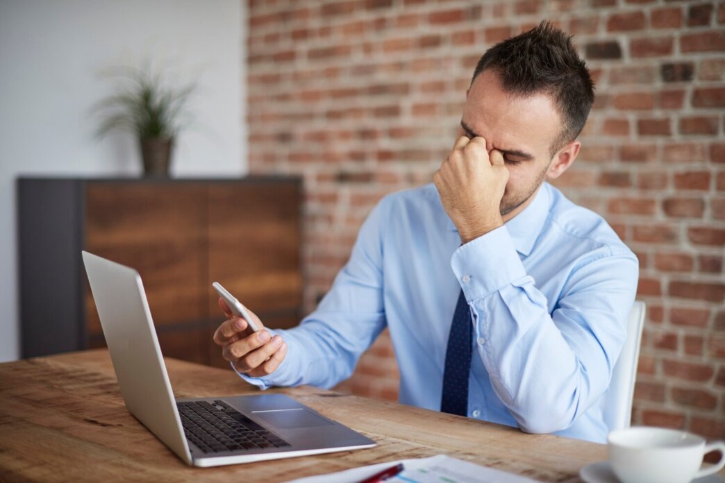 Businessman frustrated with the technical debt in WordPress website