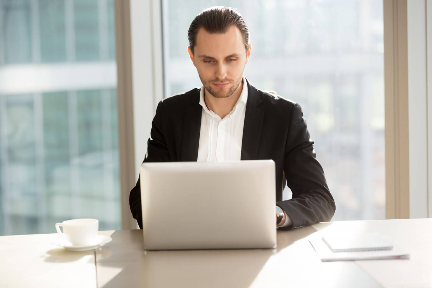 Businessman surfing information in Internet to find out more about WordPress brute-force attacks