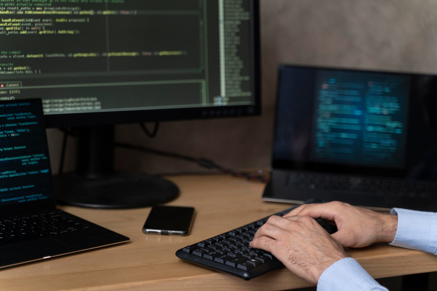 Close up hands typing on keyboard. Developer working a white-label WordPress development agency