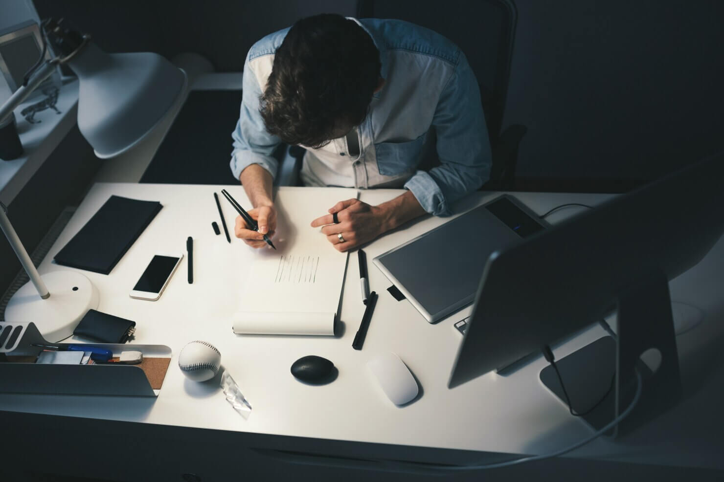 Designer at work in office. Preparing to create a figma file