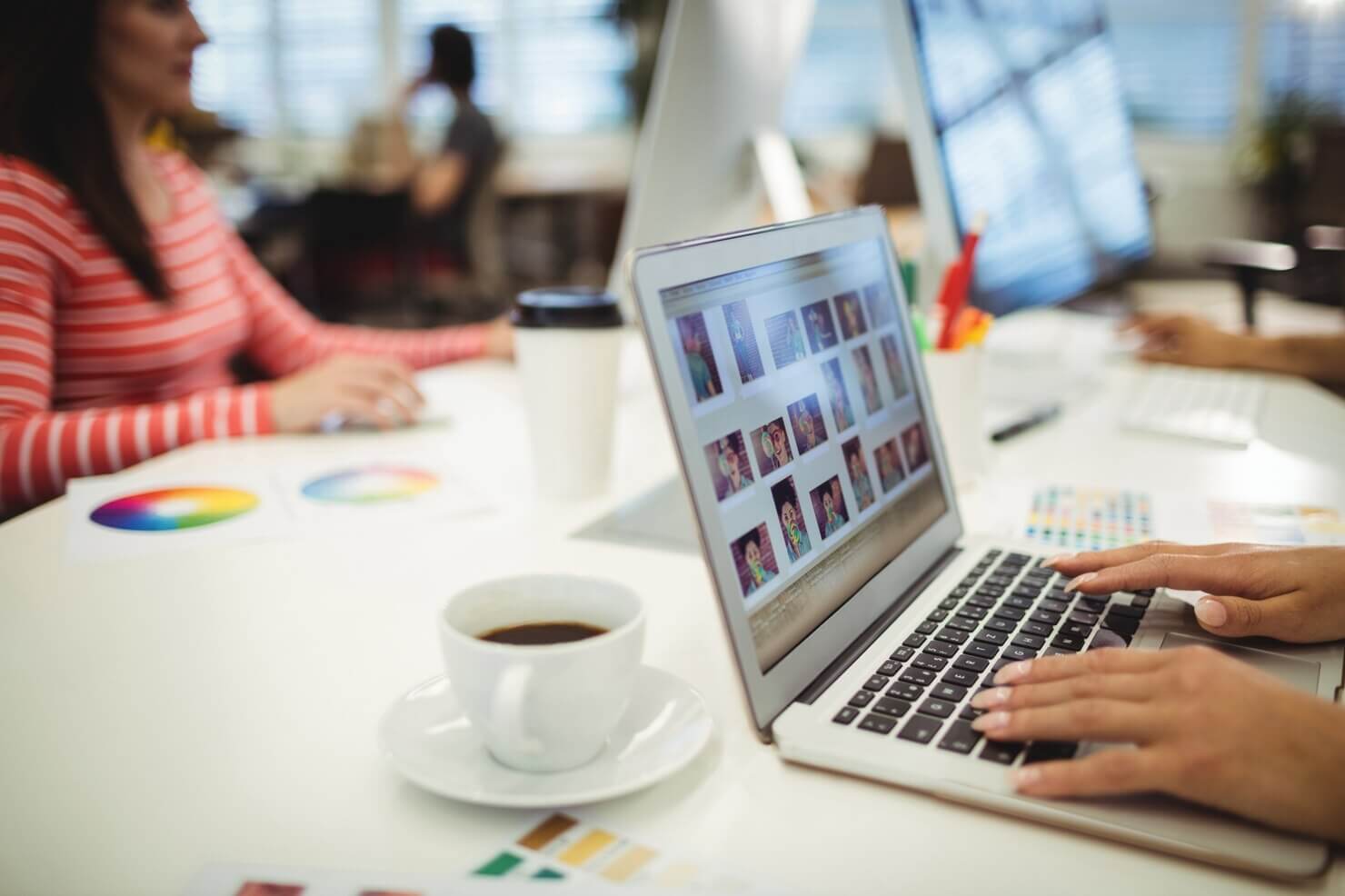 Developers working at their desk on unlimited WordPress support for website personalization