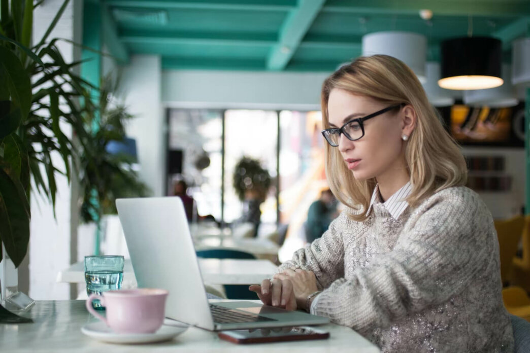 Entrepreneur reading an article about tips & tricks to create an interactive WordPress site