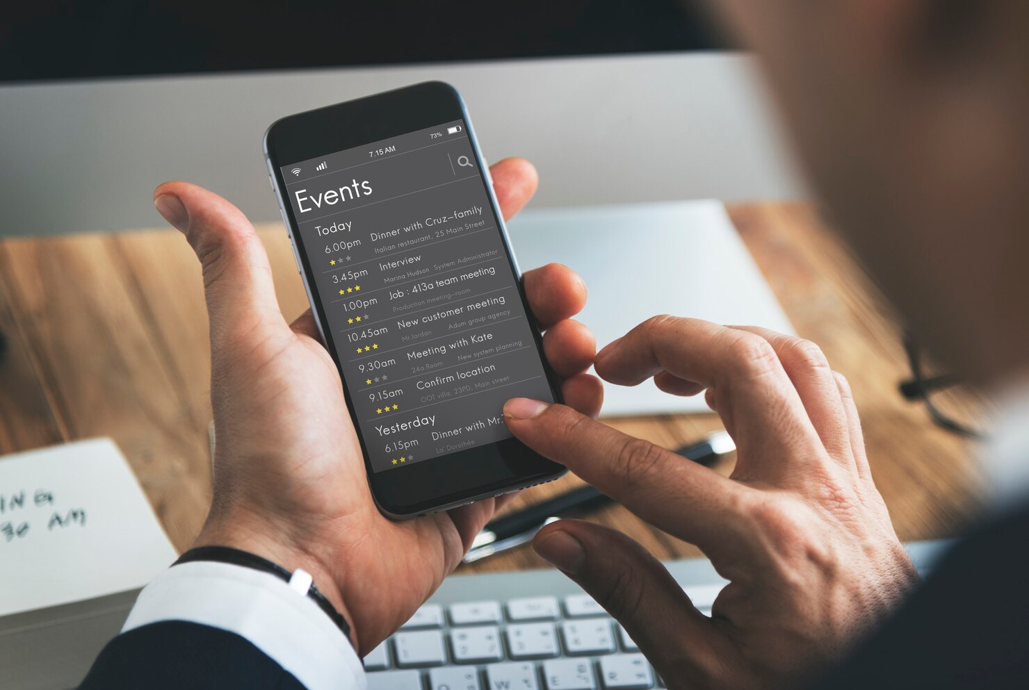 Events using one page sites. Man checking out events and contact details