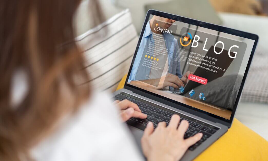 Female developer working content pruning for her WordPress site after website audit