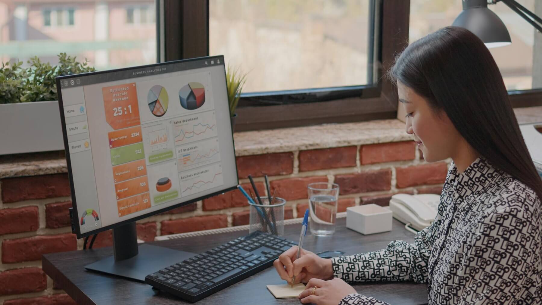 Female reviewing results after auditing website structure for better SEO