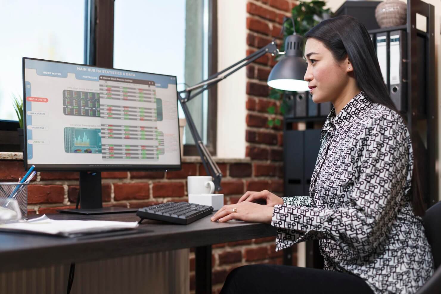 Female reviewing the assessment generated via an automated website audit tool
