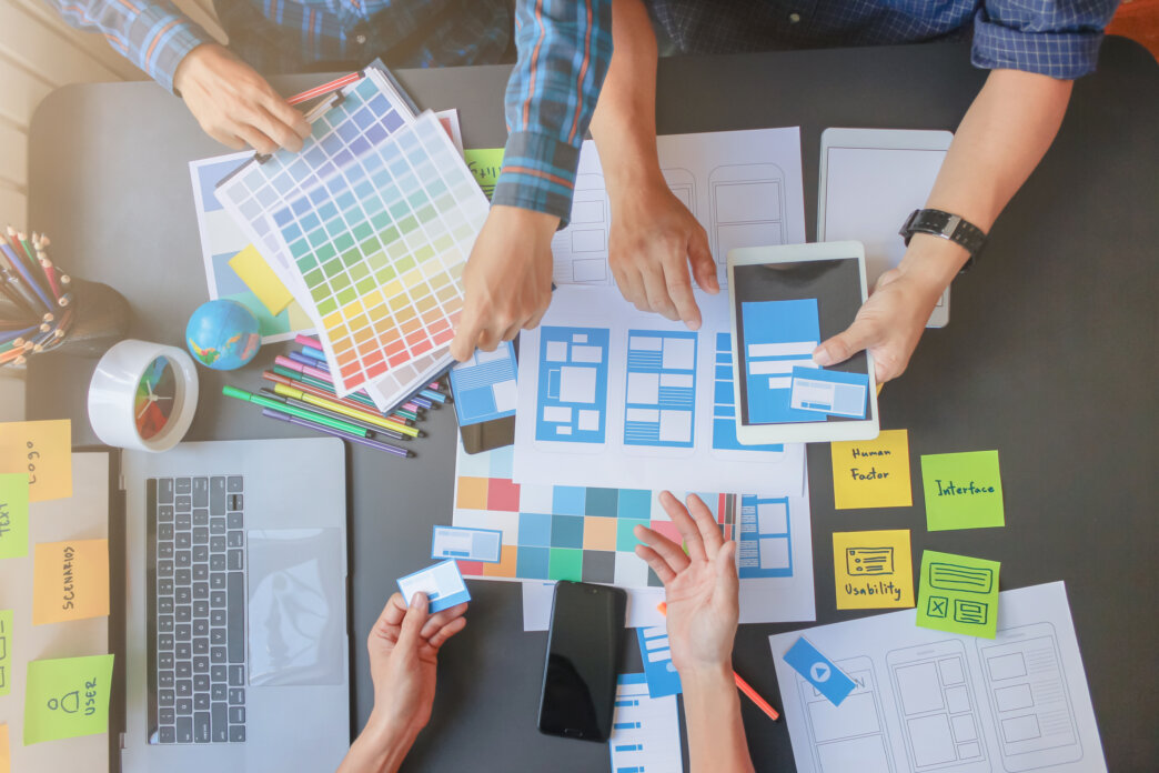 Group of developers and designers working together on usability testing