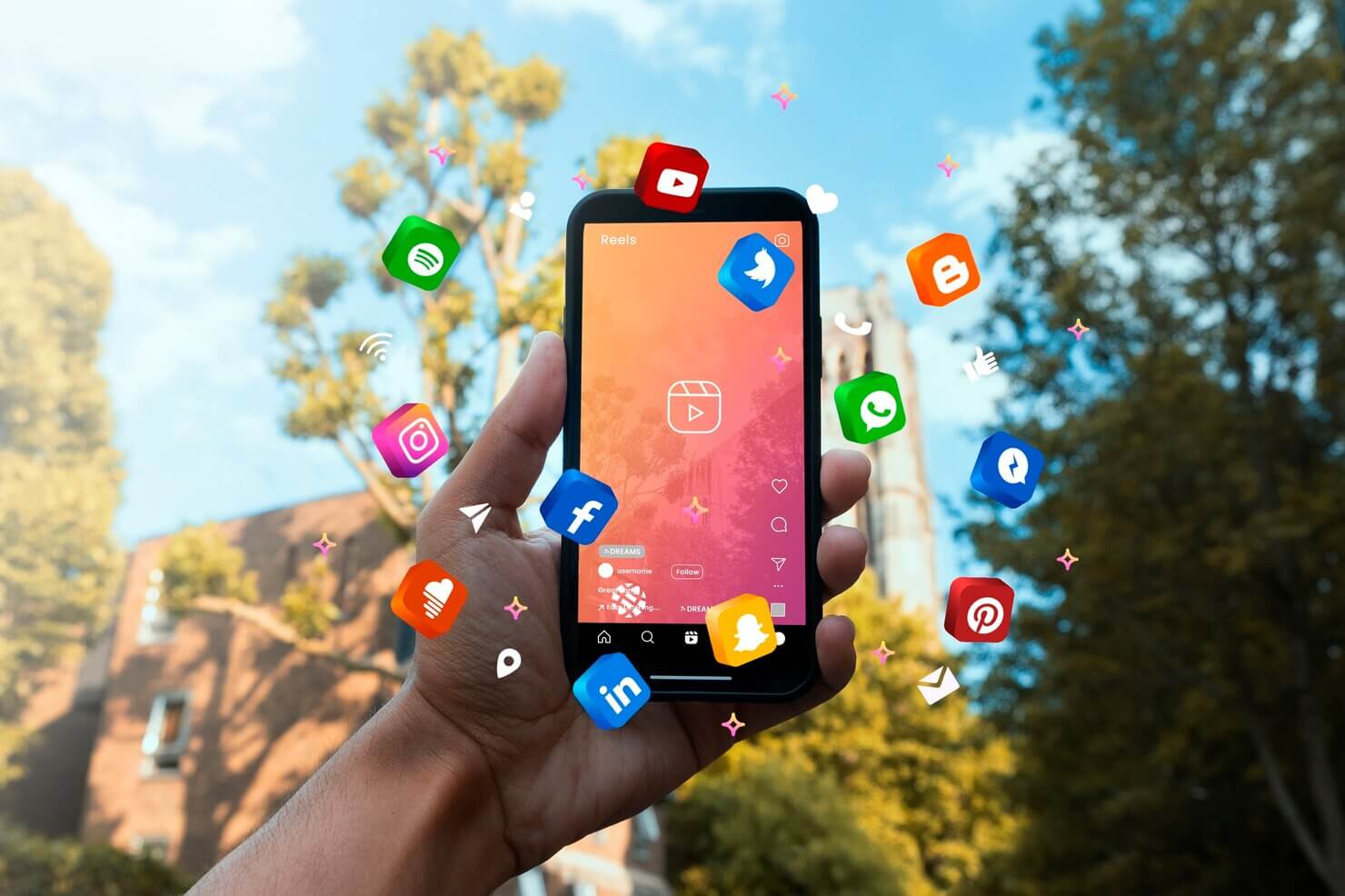 Hand holding smartphone social media engagement