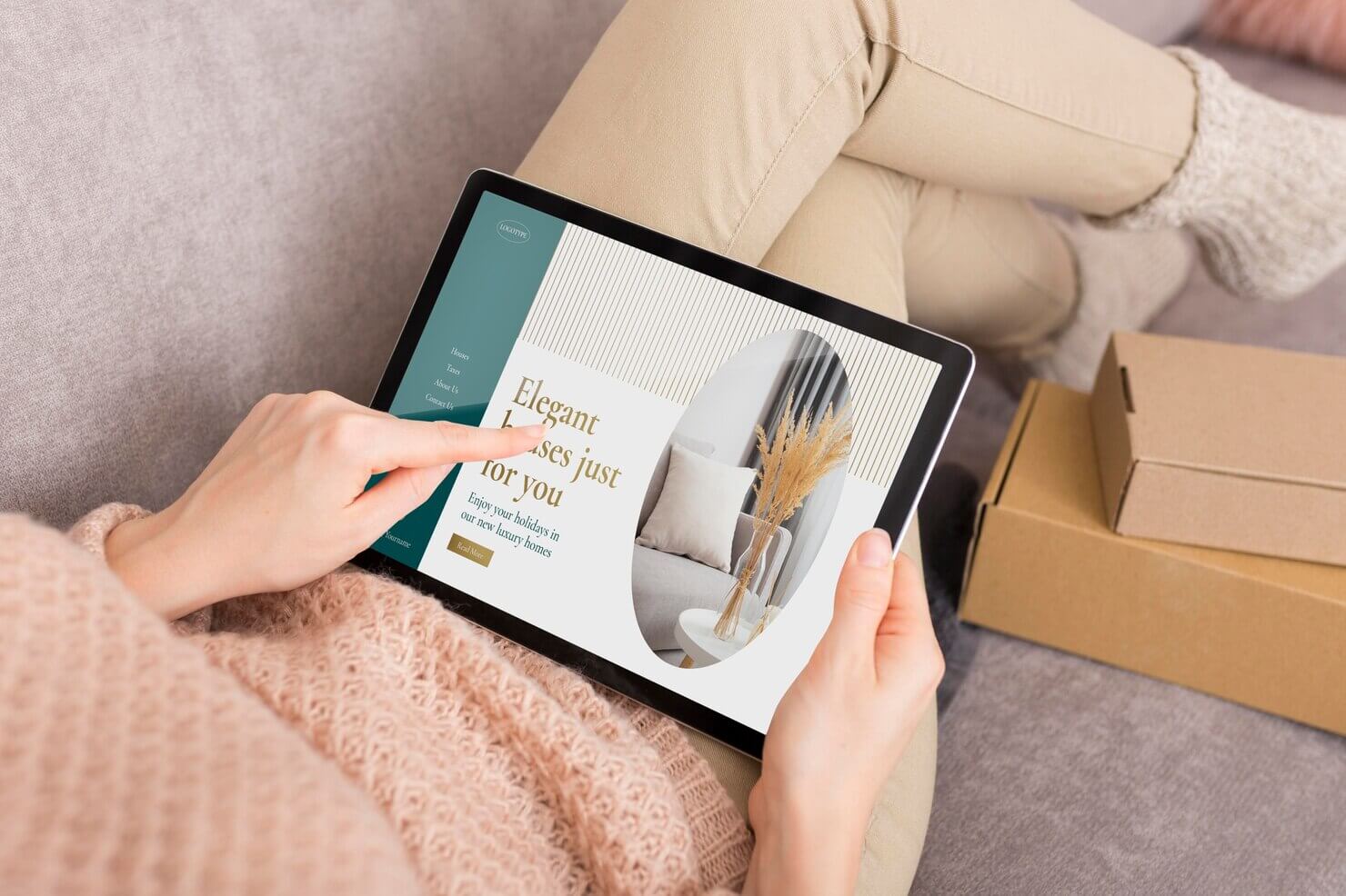 Homepage seen on tablet screen. Person checking product pages