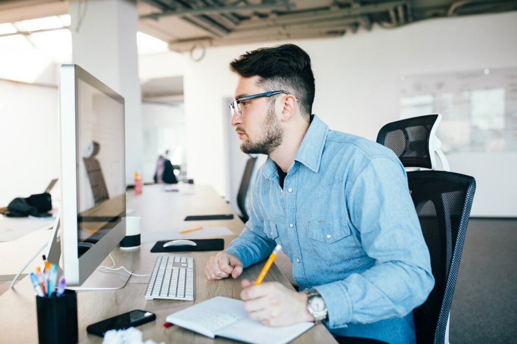 male developer working on maintaining WordPress Multilingual Sites
