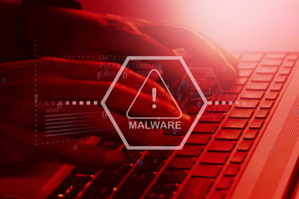 Malware removal alert on red background