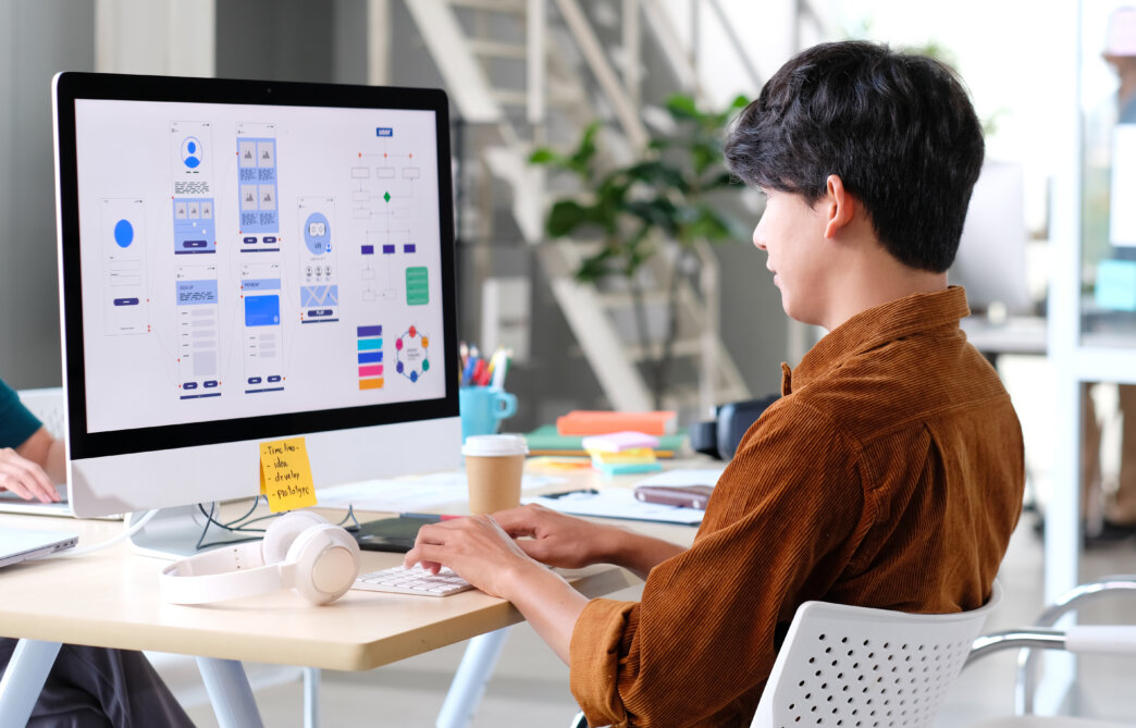 Man creating consistent design for website