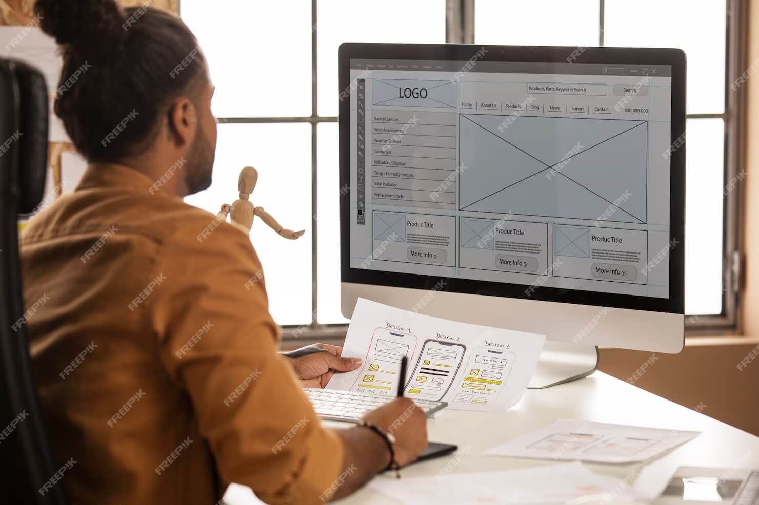 Man-designing-a-website-with-accessibility-as-a-priority