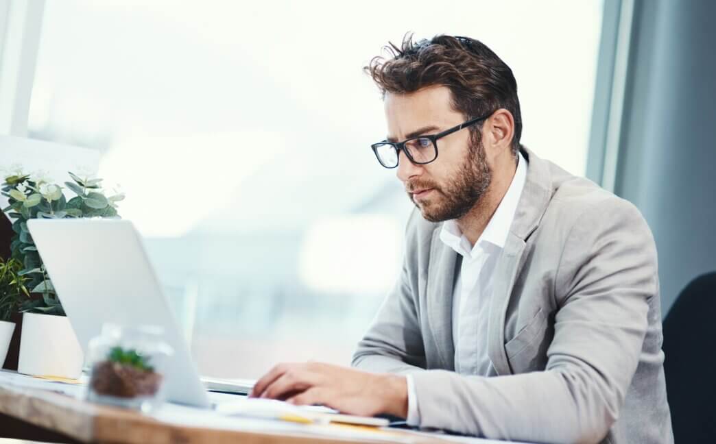 Man exploring various website audits in custom WordPress development
