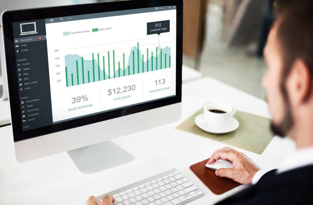 Man reviewing WordPress analytics and customers sales