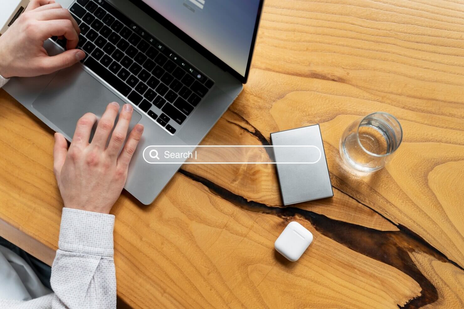 Man typing into search engine results page