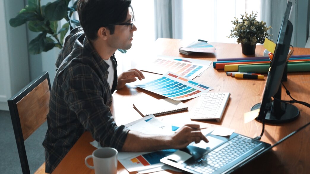 Man working on Wordpress theme customization with Figma