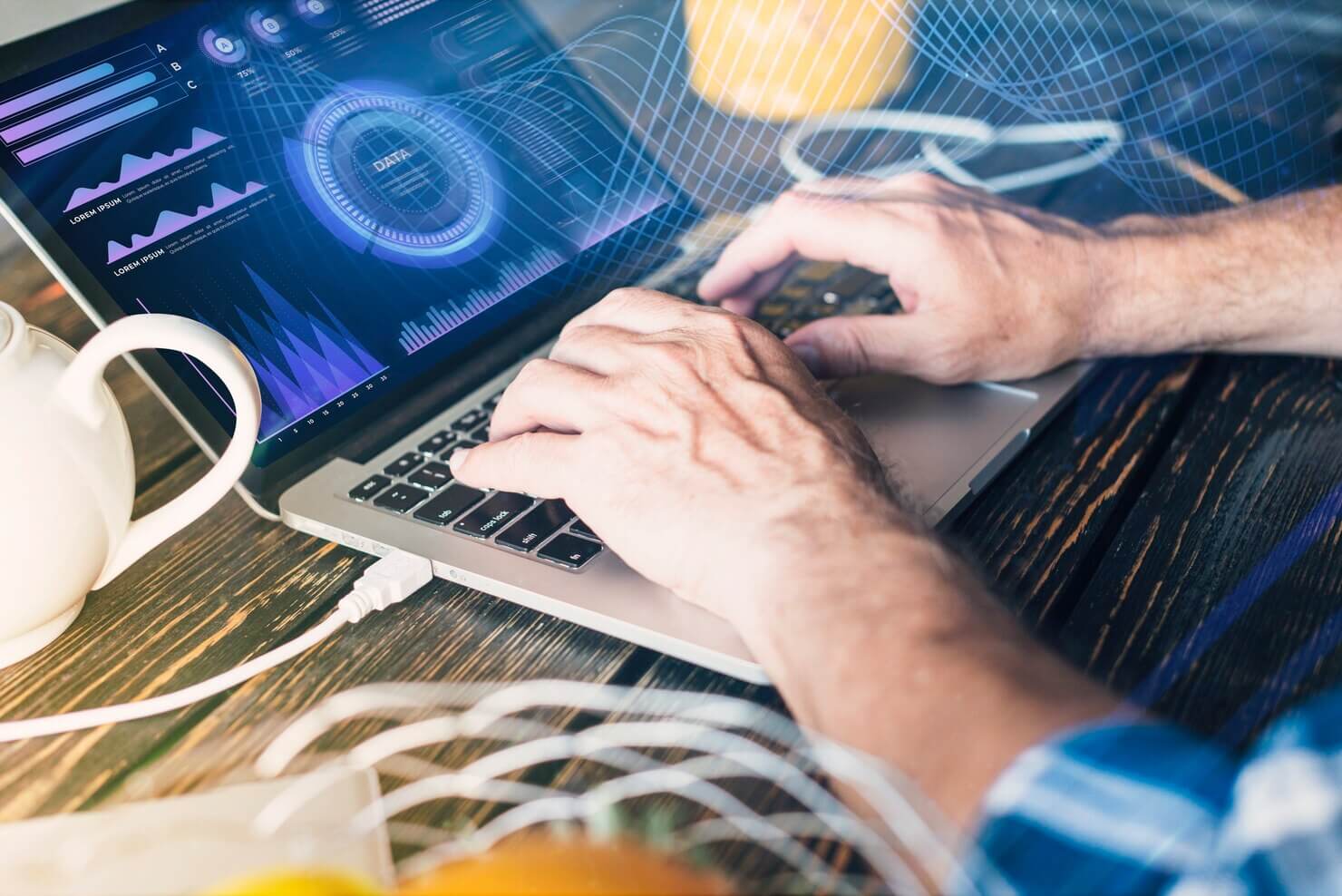 Man working to repair security issues, this is one of the hidden costs of ignoring regular website audits