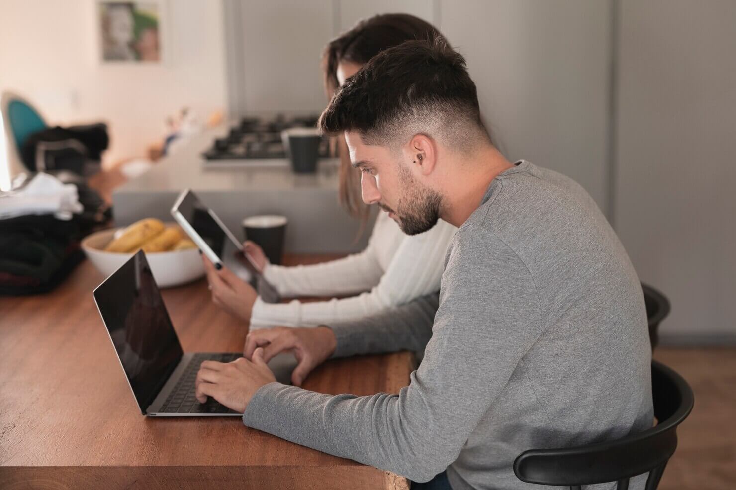 Man working with woman on creating website