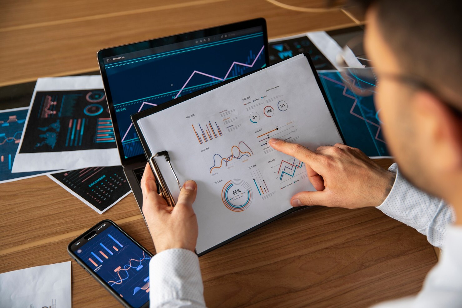 Office workers using analytics graphs to review before creating new WordPress site