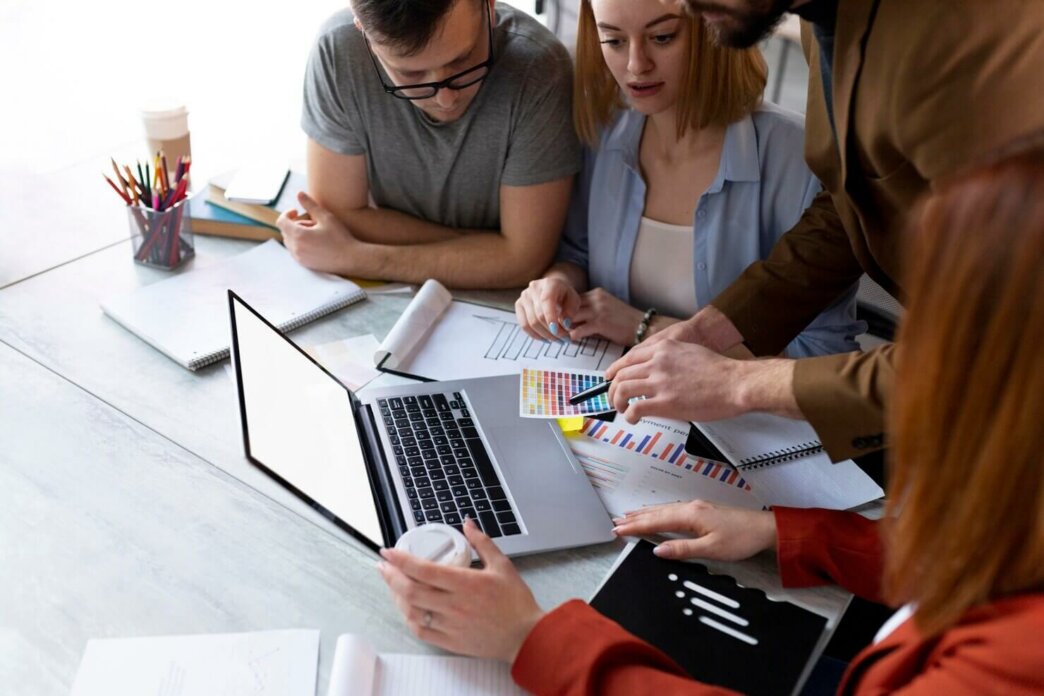 People brainstorming in a work meeting on how to use WordPress for tech startups