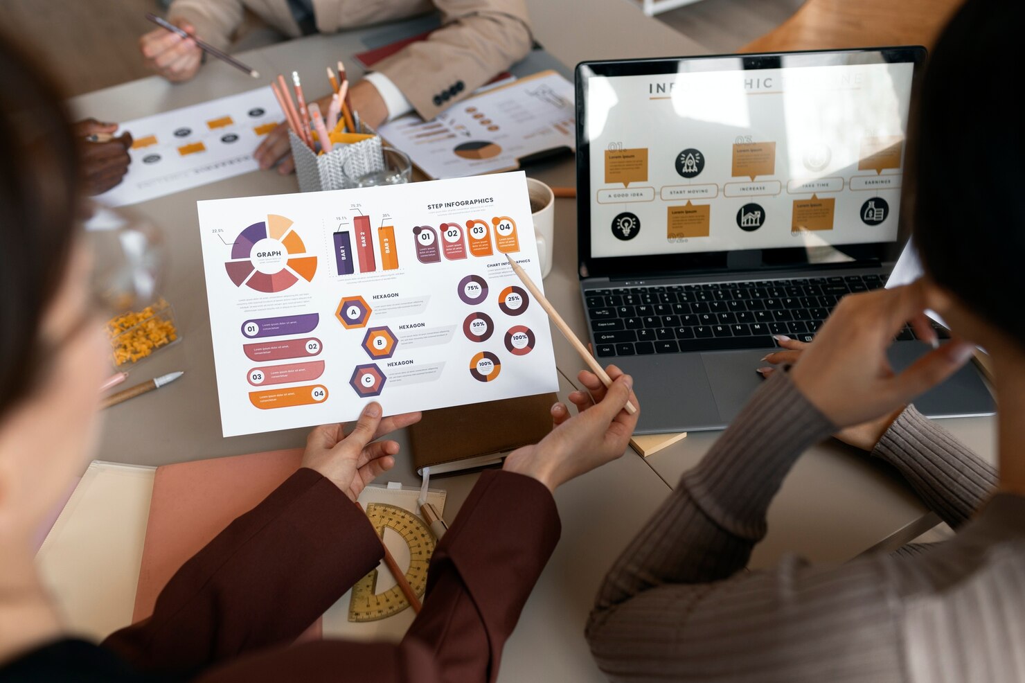 People working with laptop analyzing SEO metrics WordPress vs Webflow