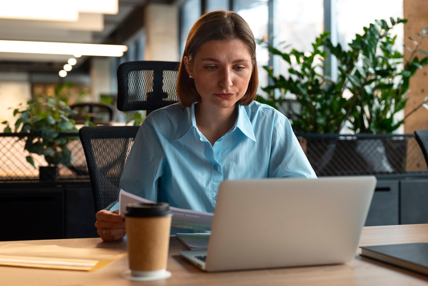 Person in the office checking when to use page builders to develop WP site