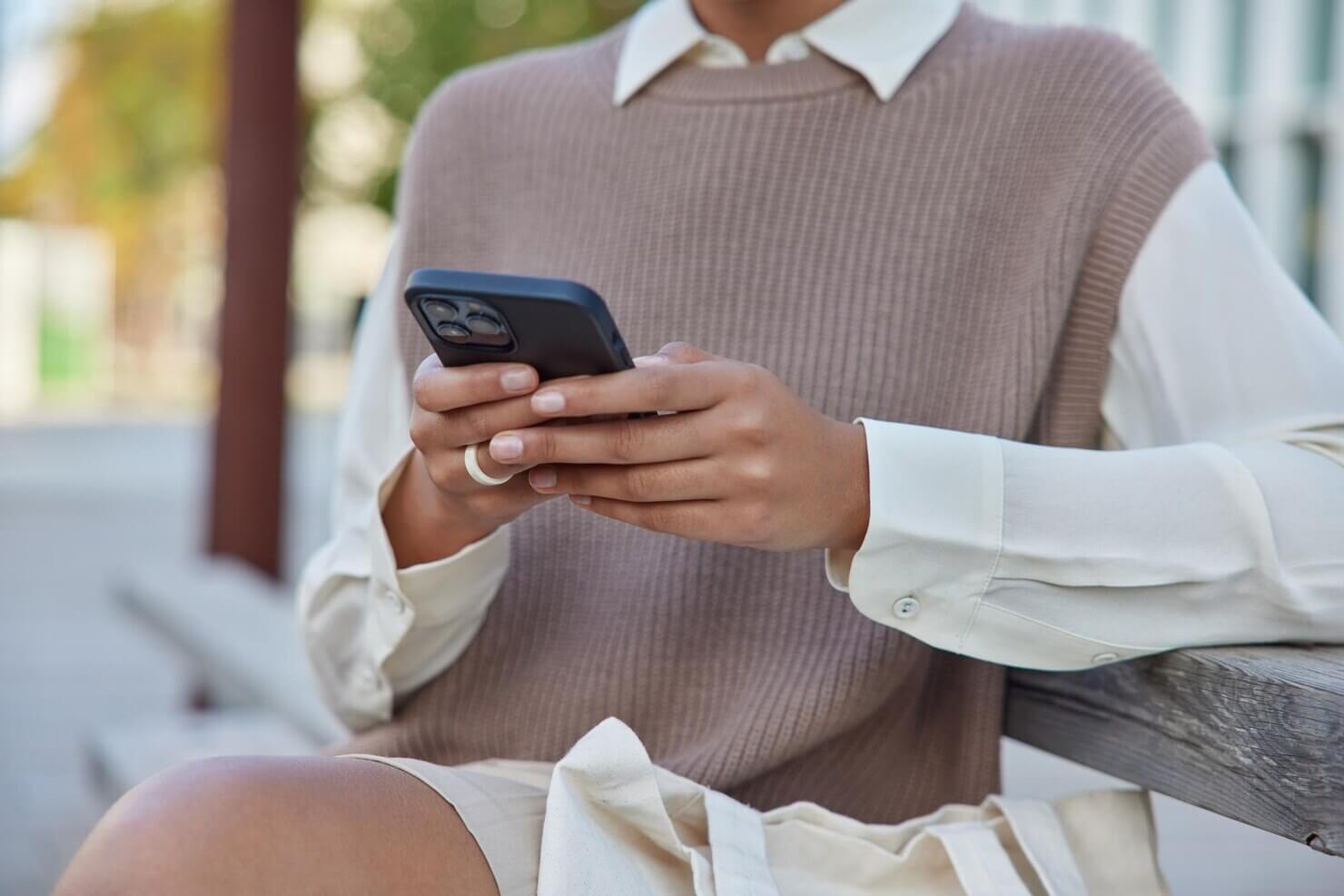 Person trying to scroll through website on mobile phone