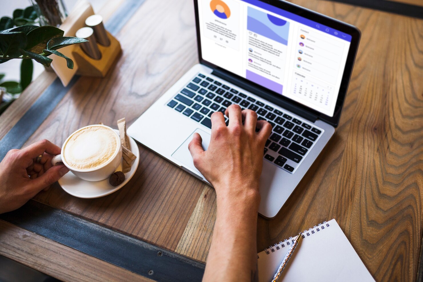 Person using laptop in cafe. Online reviews notification on WP social proof