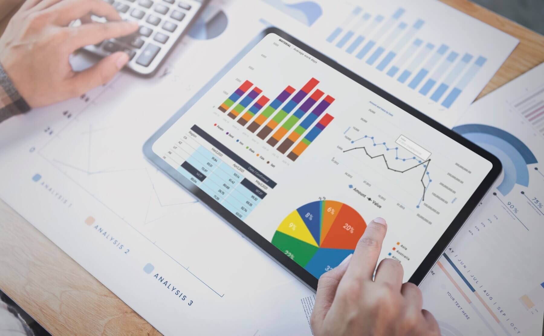 Person using tablet to analyze business development