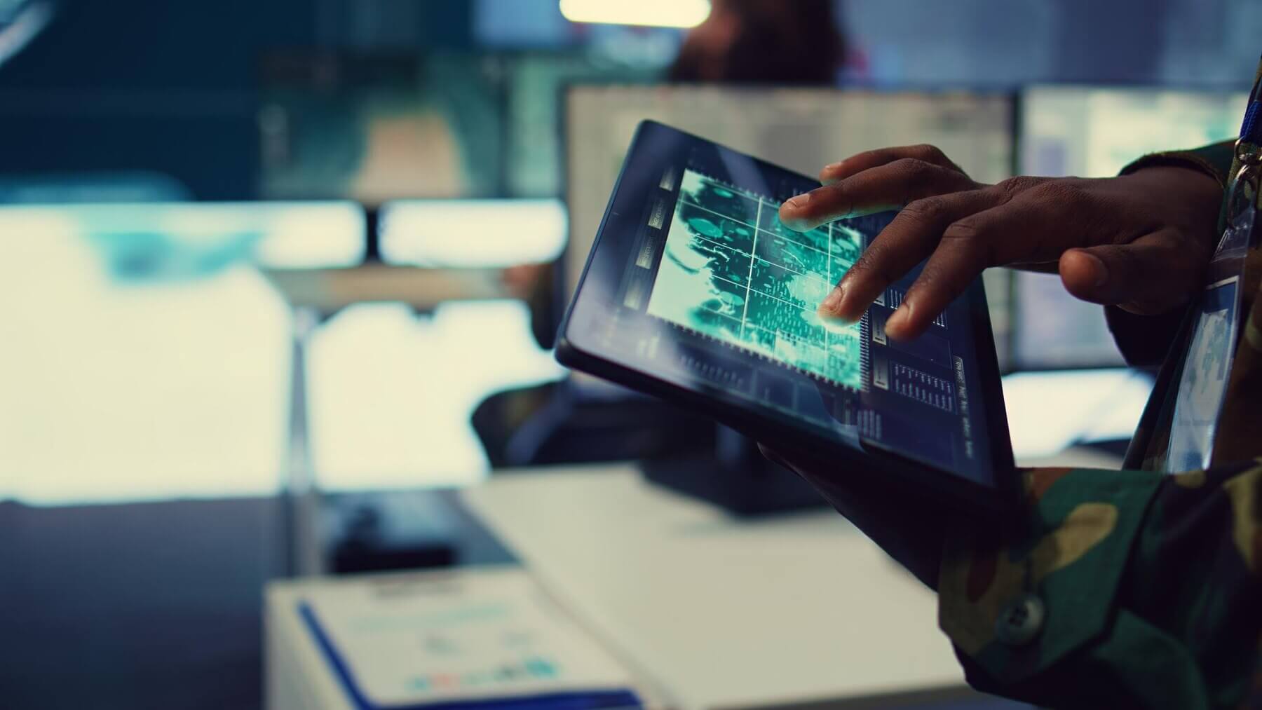 Person using tablet to monitor site performance