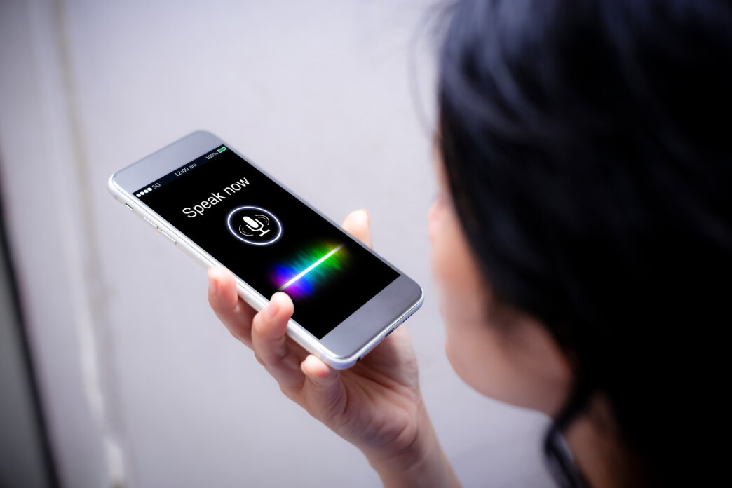 Person using voice search on their phone to look up information on the internet