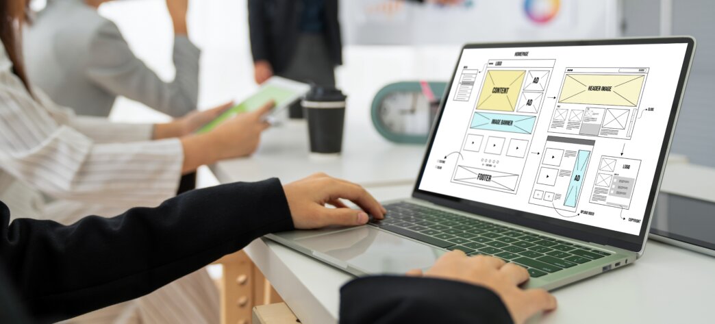 Person using WordPress design psychology to create web pages layout