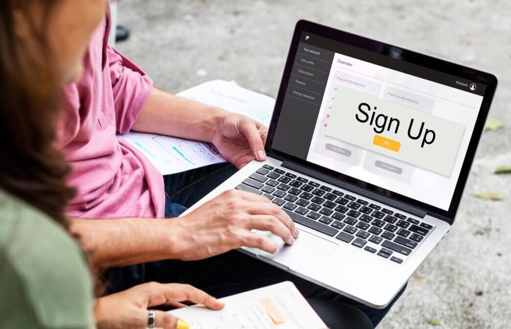 Pop-up on laptop. People deciding on auditing website pop ups and ctas