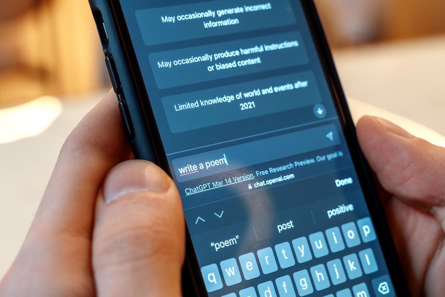 Smartphone with opened ai chat in it. AI & natural language processing on chatbot