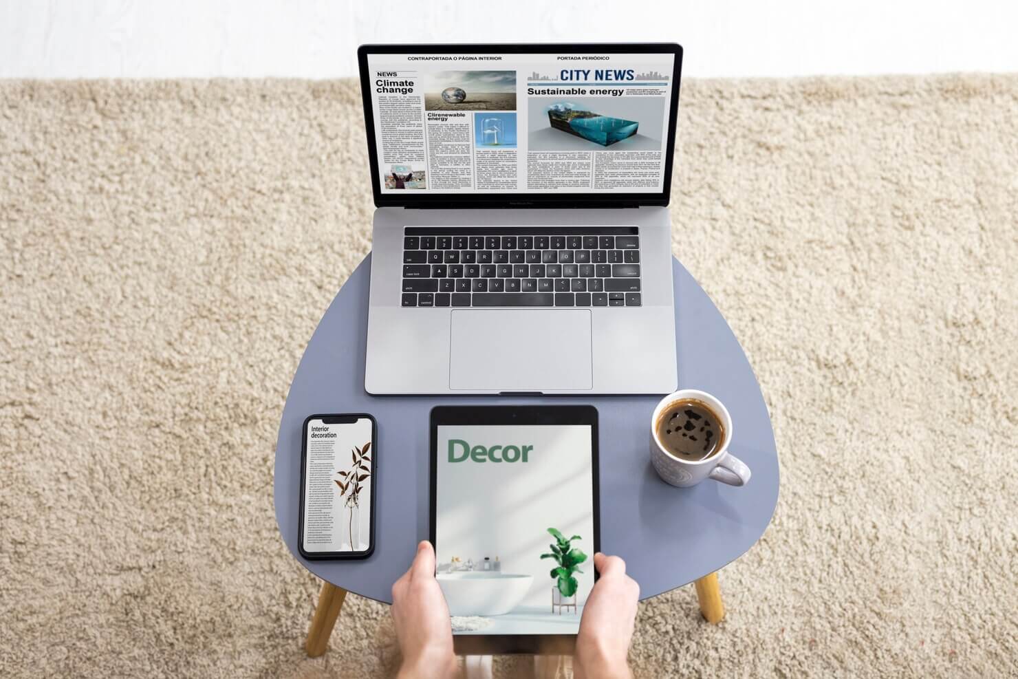 Top view hands holding tablet with laptop and phone on table. Mobile devices are an important part of landing page conversion