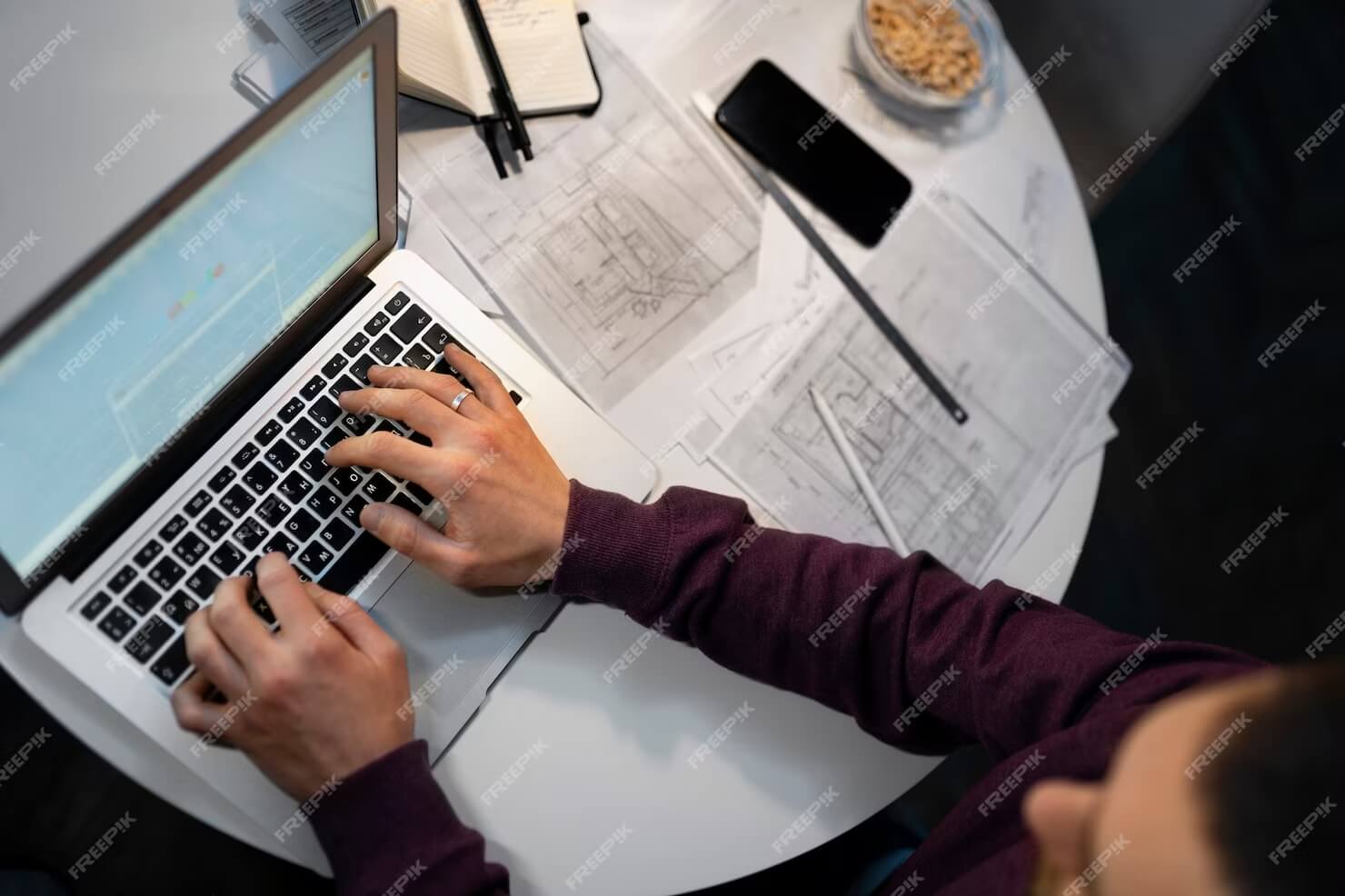 Top-view-man-working-late-at-night-on-user-journey-with-WordPress-design