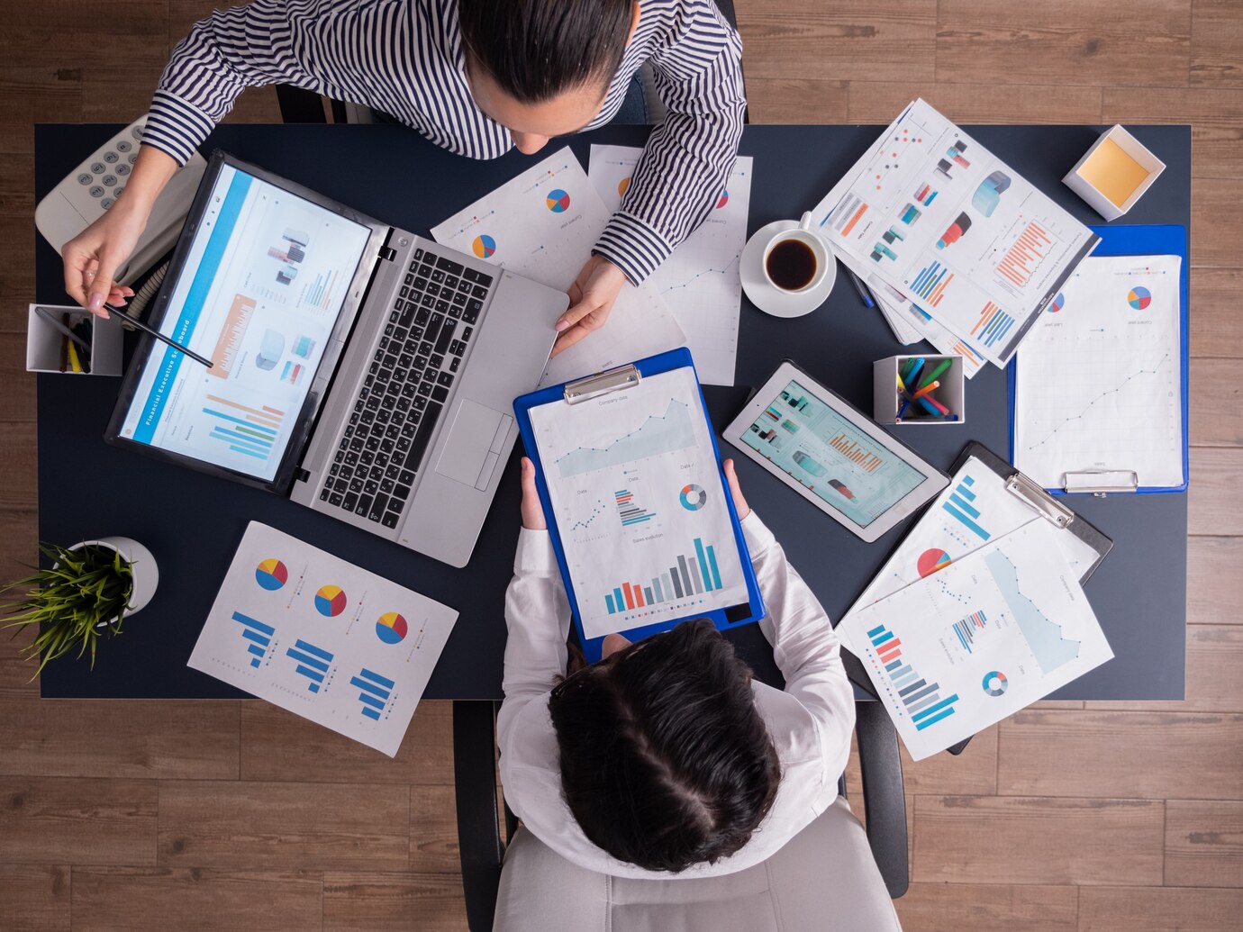 Two people analyzing SEO and how to better search engine results