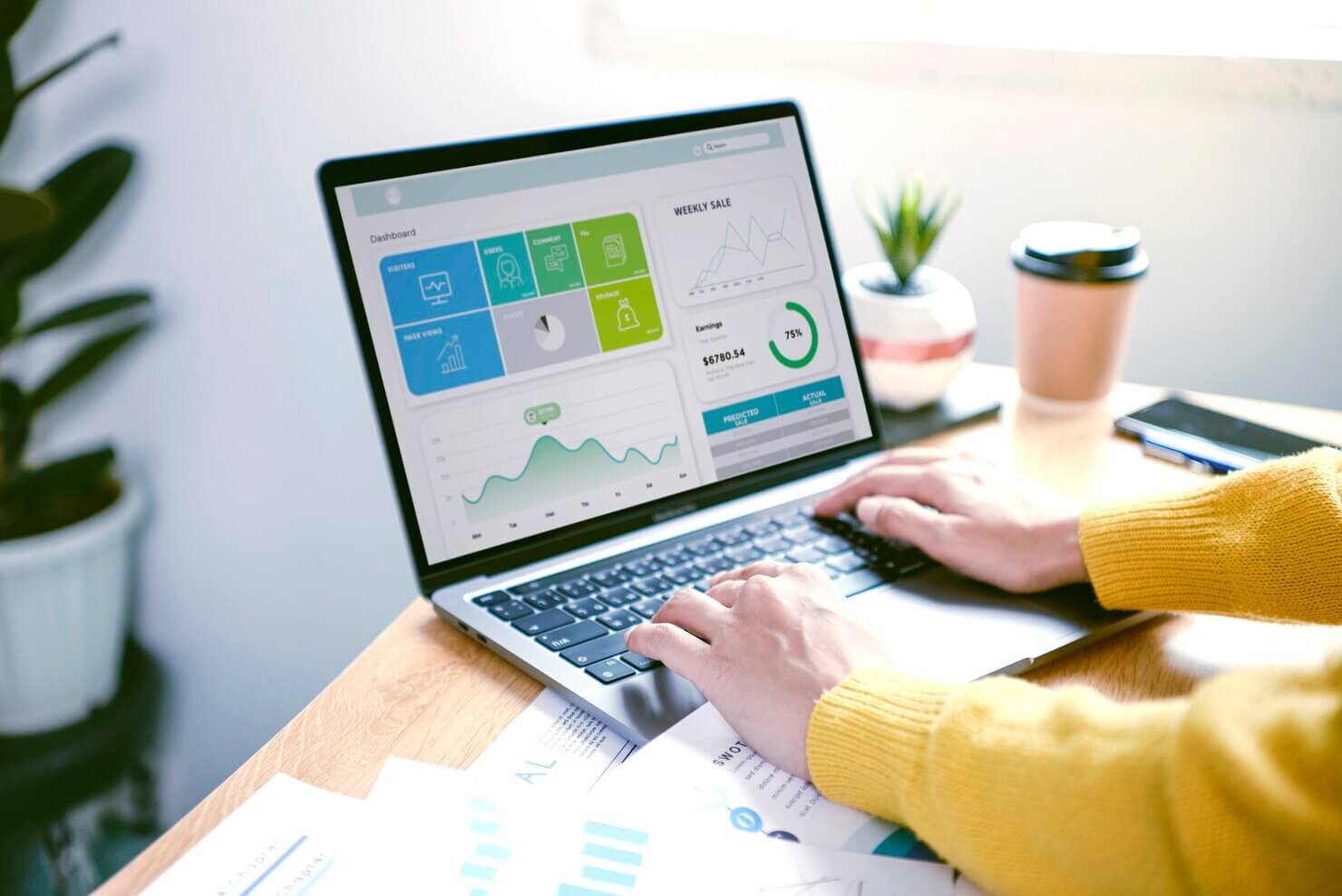 Website developer working on creating an audit report and guide on how to successfully implement changes