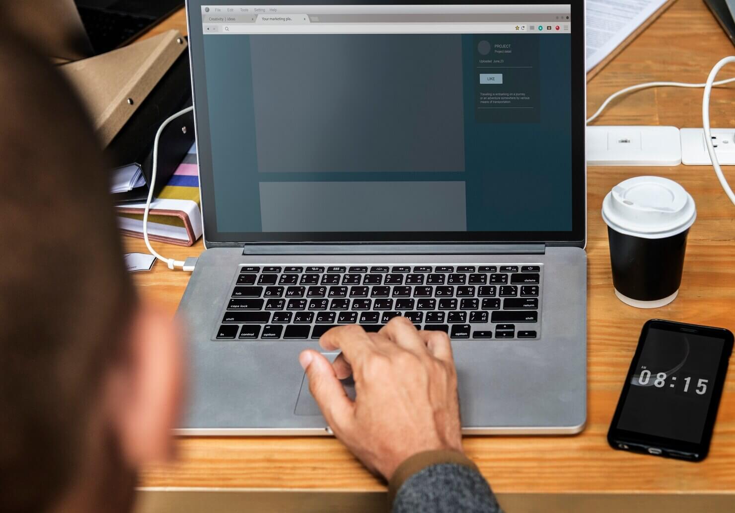 Website template design on a laptop screen. Person testing and iterating for accessbility improvements