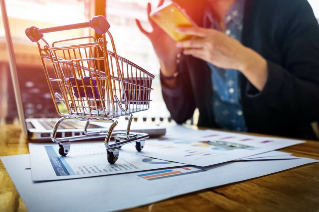 Woman building a WooCommerce shop & testing out payment methods