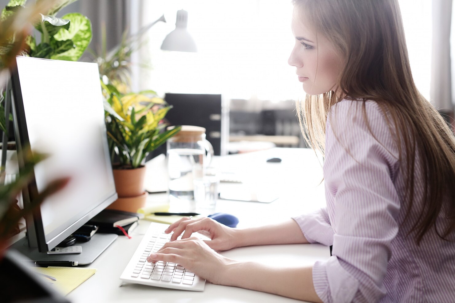 Woman in the office running a:b testing in WordPress websites