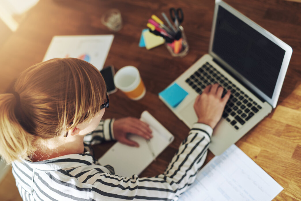 Woman research WordPress vs webflow to create website for her business