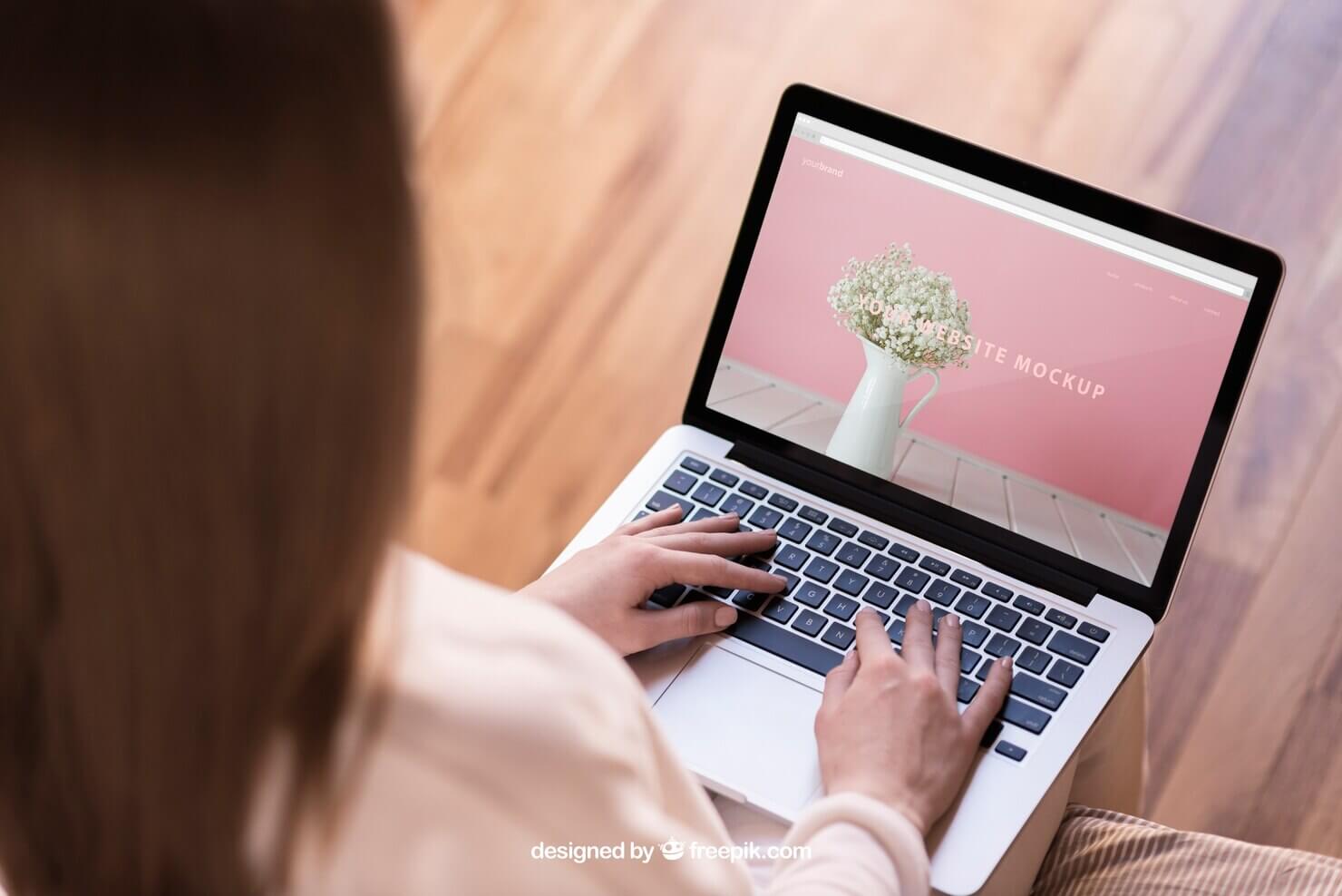 Woman typing on laptop looking to optimize WordPress website navigation