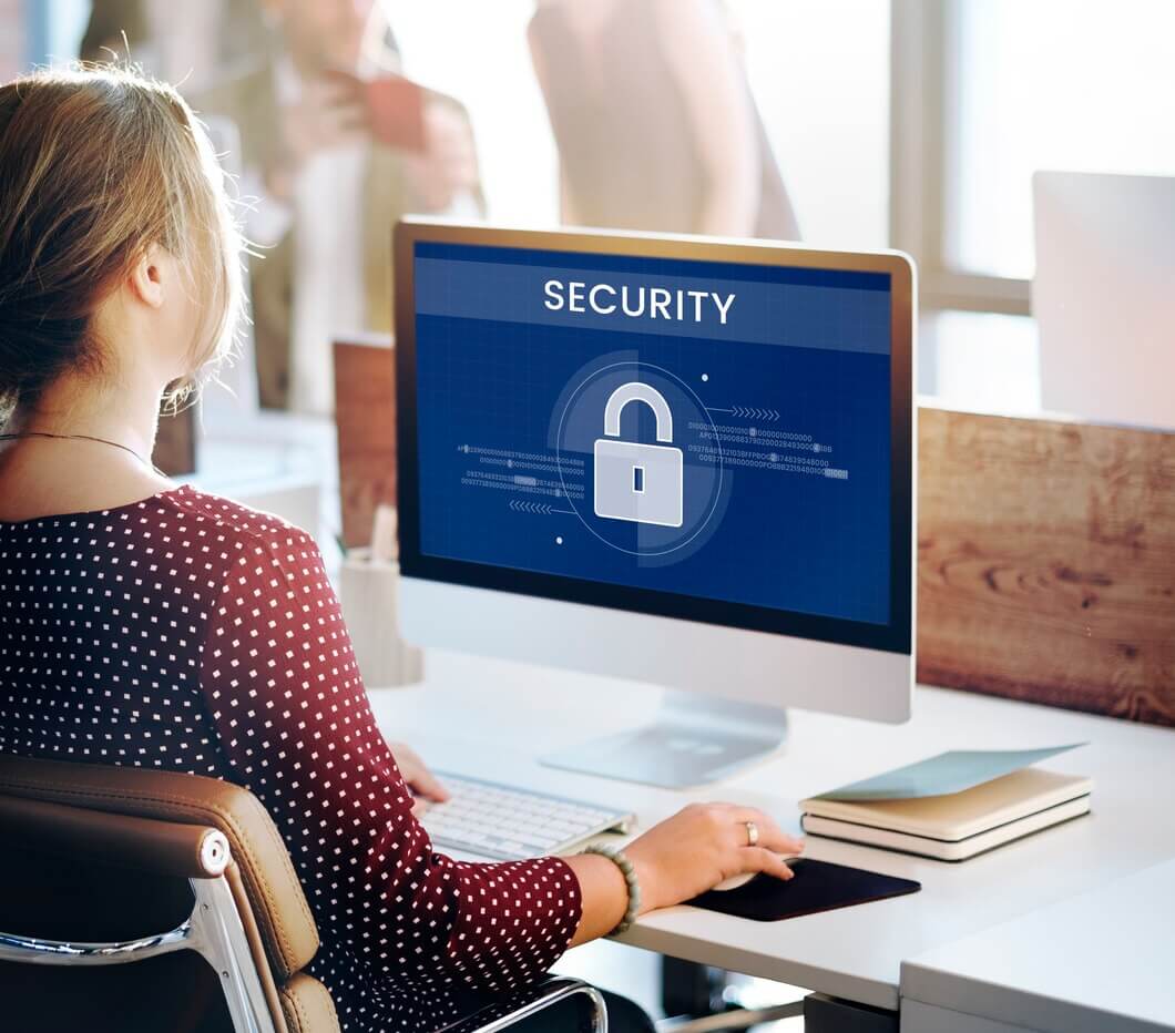 Woman working on computer network security for website