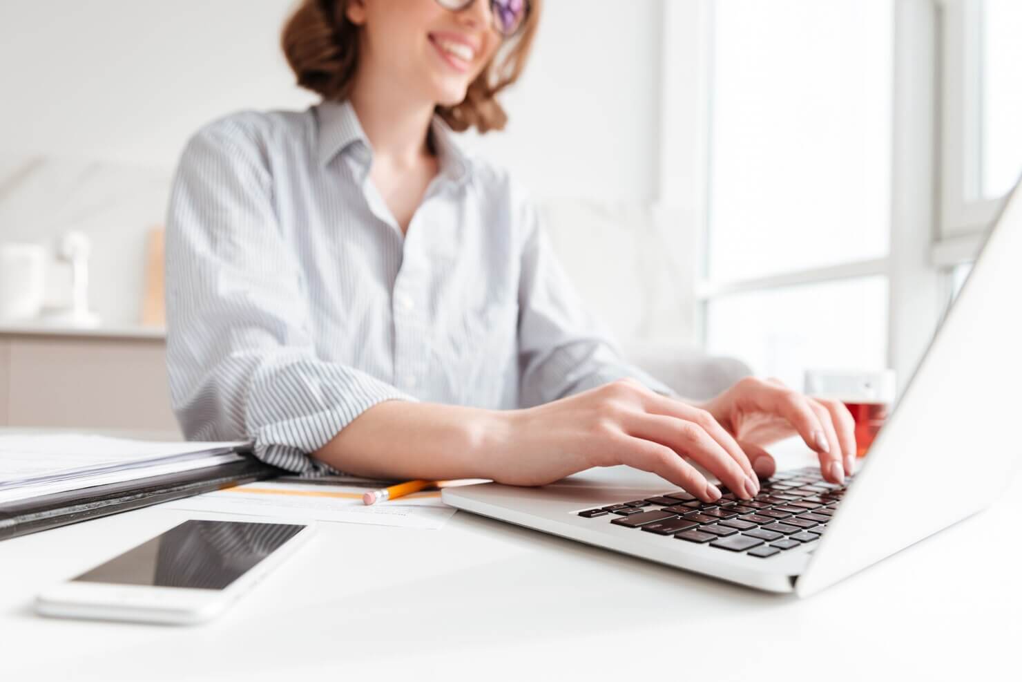 Woman working to enable native lazy loading for background images. She is happy with performance after she add lazy loading