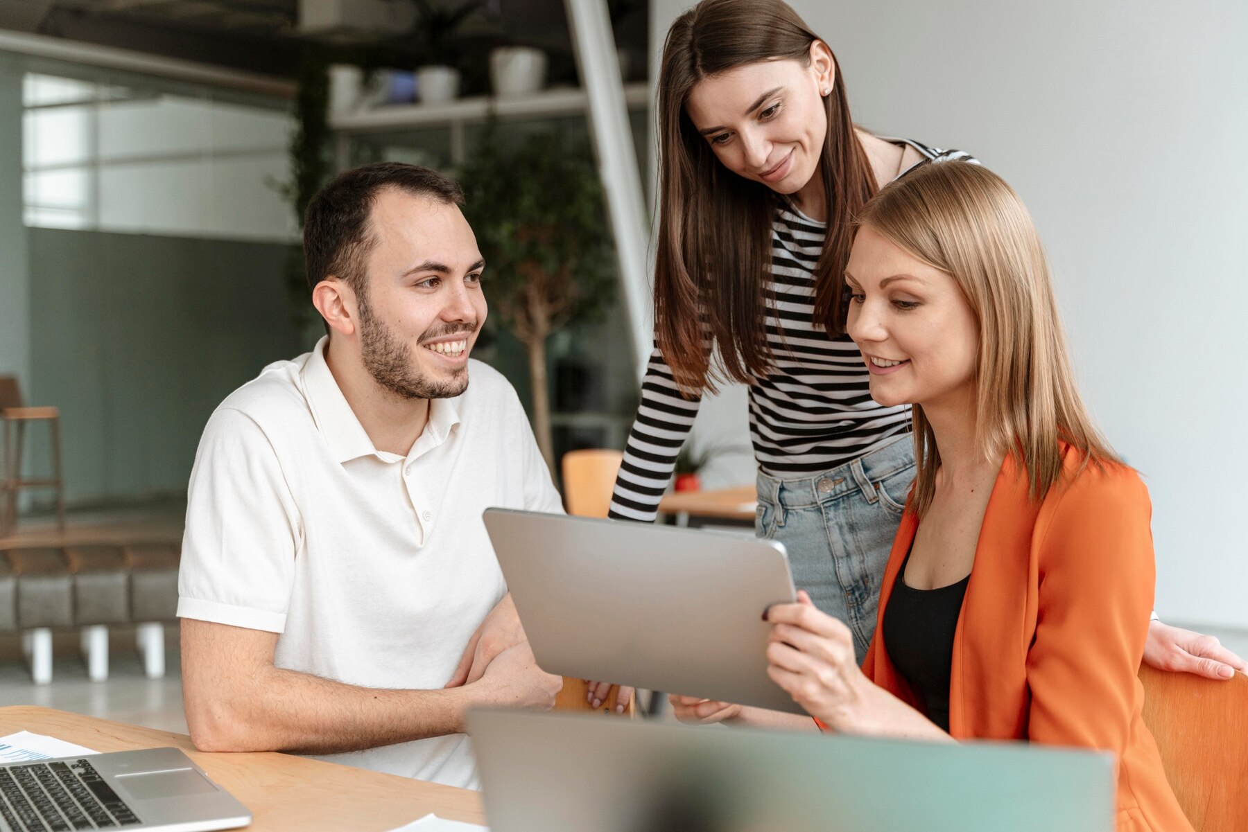 Young business people having a remote meeting us their tablet. They want to discuss organisational differences with their outsourcing agency