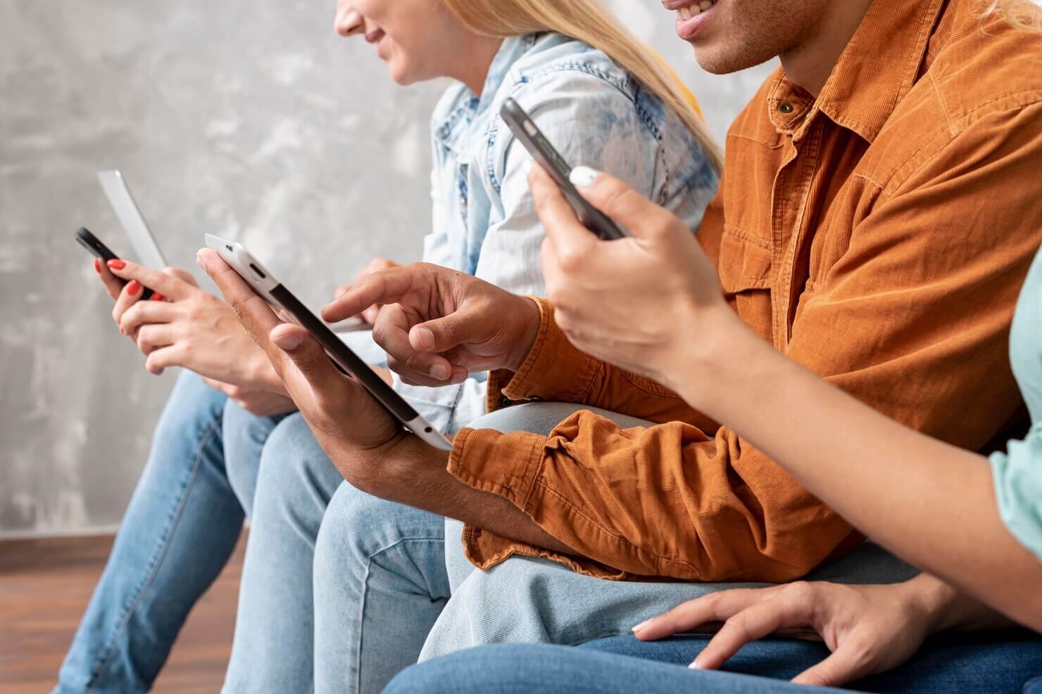 Young people scrolling on their phones